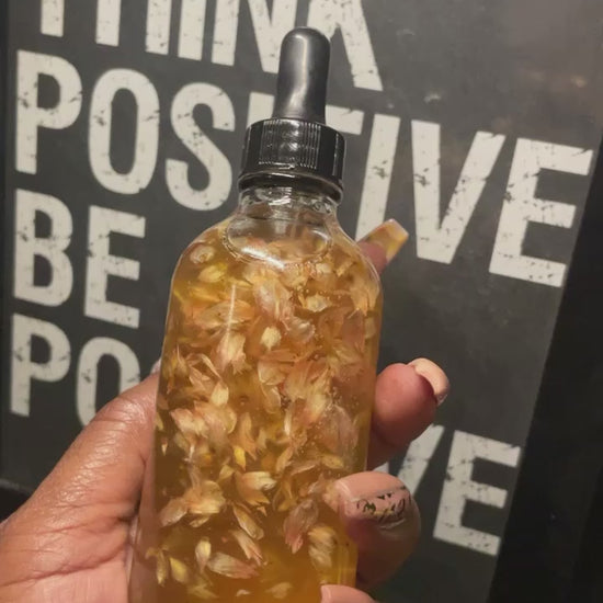 body oil in glass container